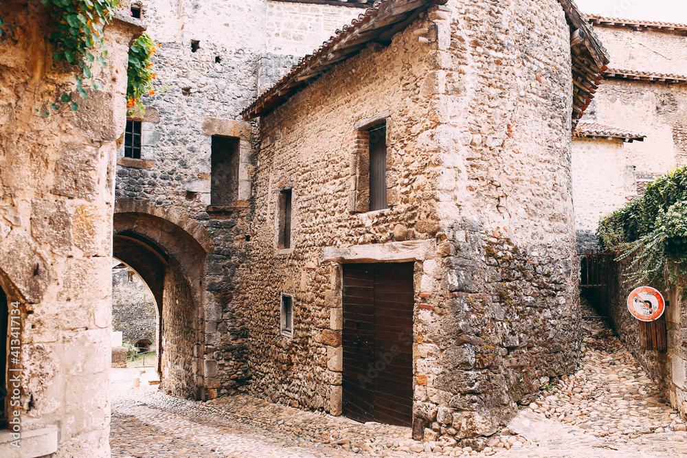 Facade of old stone buildings in Perouges, France