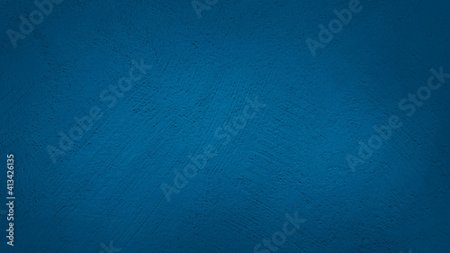 texture of plastered blue concrete wall. vignette modern background of brushed cement or stucco wall background use as background ,template ,banner ,advertising ,card.