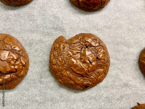 Chocolate Brownie Cookies with Cacao Nibs on Wooden Plate.
