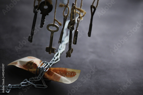 Business concept. The depreciation of the national currency. Bill with the inscription "5000 thousand rubles". Inflation and stagnation. Tighten russian bill with measuring chain.