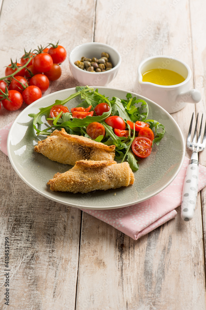 rolled sword fish with capers arugula and tomatoes salad rolled sword fish with capers arugula and tomatoes salad