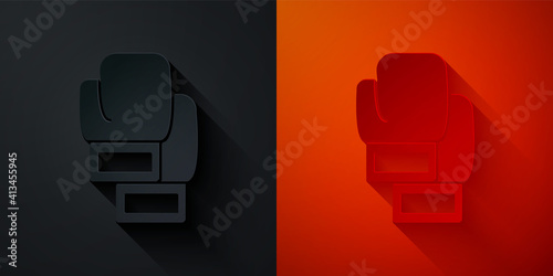 Paper cut Boxing glove icon isolated on black and red background. Paper art style. Vector.