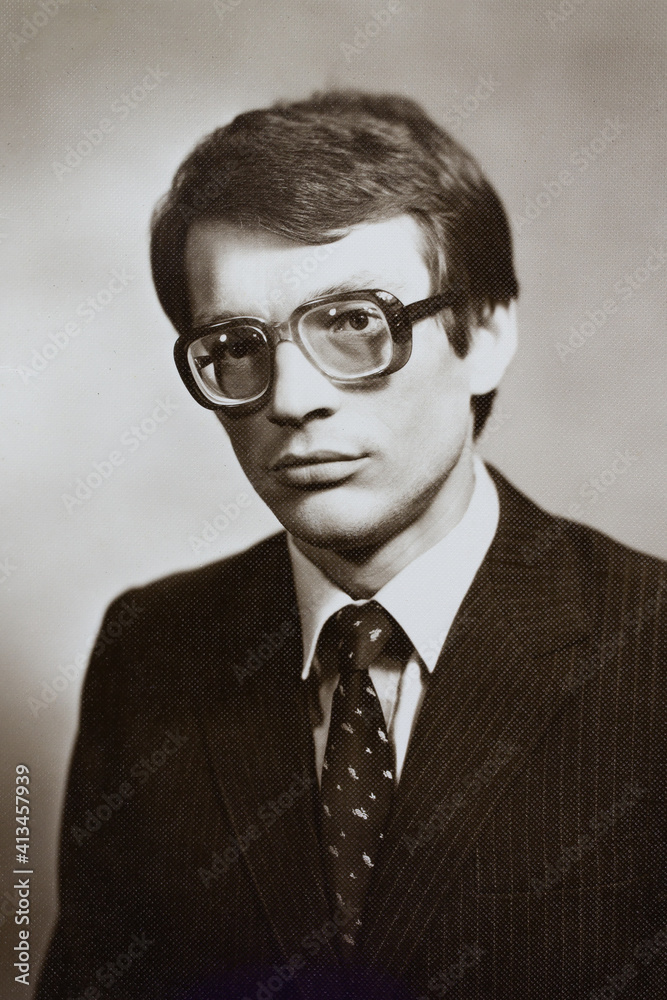 Portrait of young Soviet guy with glasses, in jacket and tie. Vintage black  and white paper photo, 1970s. Transferred property, family archive.  Outdated quality Stock Photo | Adobe Stock
