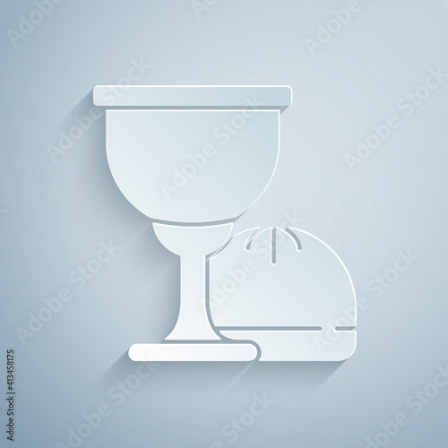 Paper cut Holy grail or chalice icon isolated on grey background. Christian chalice. Christianity icon. Paper art style. Vector.