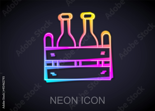 Glowing neon line Pack of beer bottles icon isolated on black background. Wooden box and beer bottles. Case crate beer box sign. Vector.