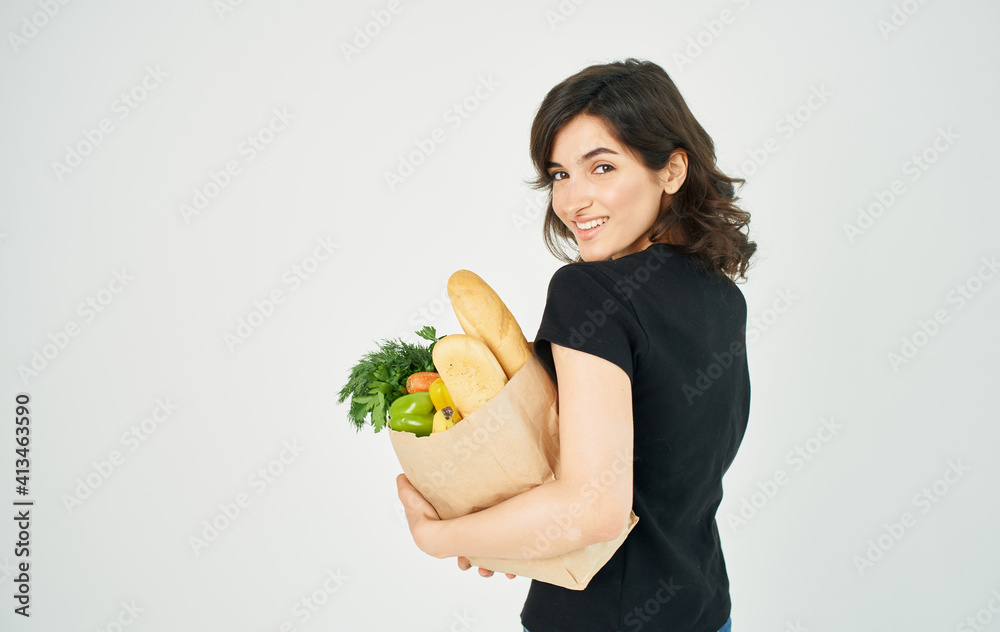 Woman with package of healthy diet food household shopping in store Woman with package of healthy diet food household shopping in store