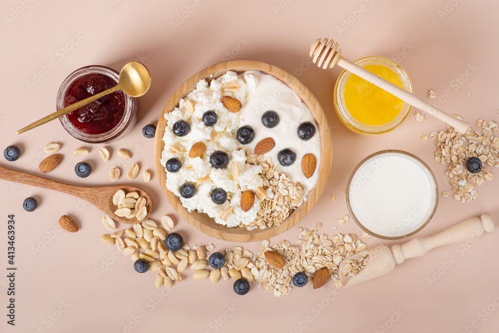 Yogurt with granola and fresh blueberries, in glass bowl Yogurt with granola and fresh blueberries, in glass bowl