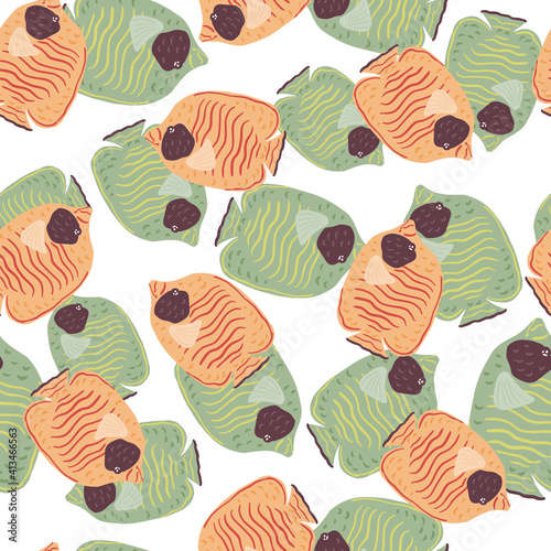 Seamless pattern in doodle style with hand drawn random orange and green butterfly fishes. Isolated print.