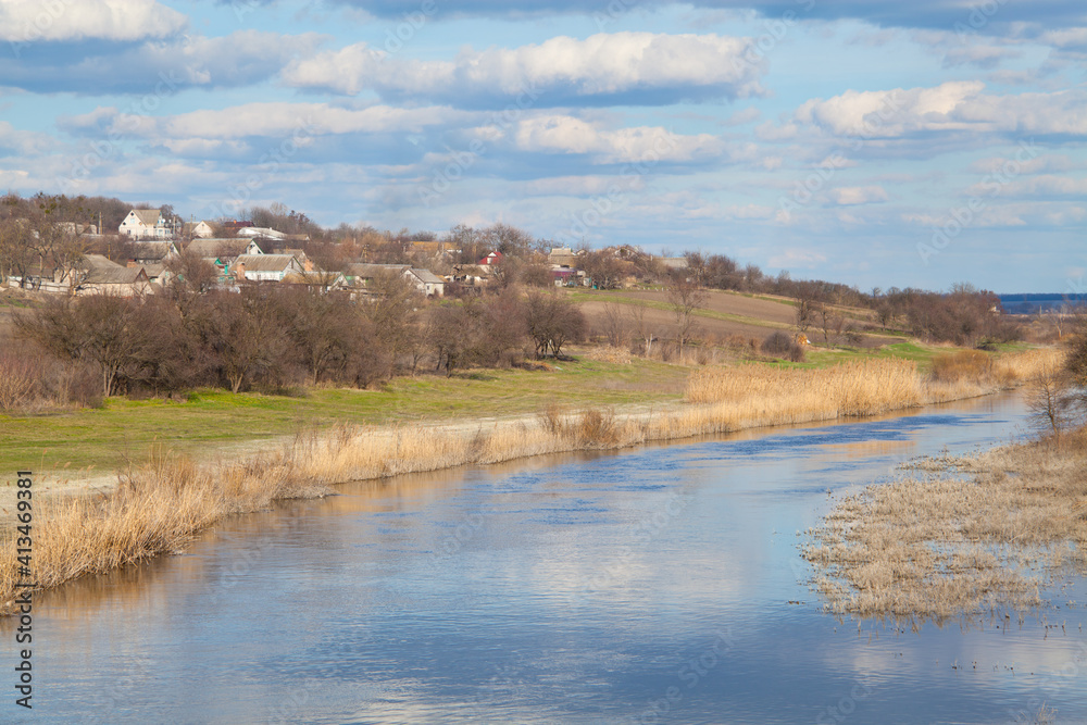 Rural landscape with bright blue sky reflected in the river Samara. Rural landscape with bright blue sky reflected in the river Samara.