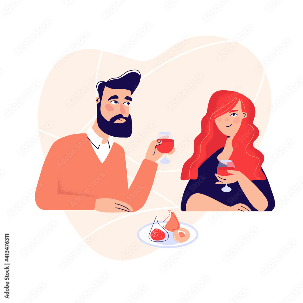 Dating. Valentines day celebration. Sweet happy young couple having romantic dinner with glasses of red wine on date.Drink wine.Christmas evening celebration.Pair couple together at the dinner table. Dating. Valentines day celebration. Sweet happy young couple having romantic dinner with glasses of red wine on date.Drink wine.Christmas evening celebration.Pair couple together at the dinner table.