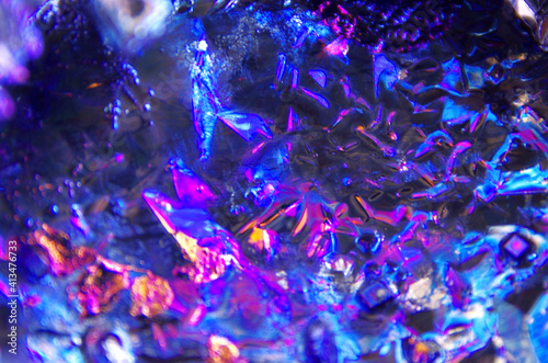 Melting Bismuth surface closeup by microscope