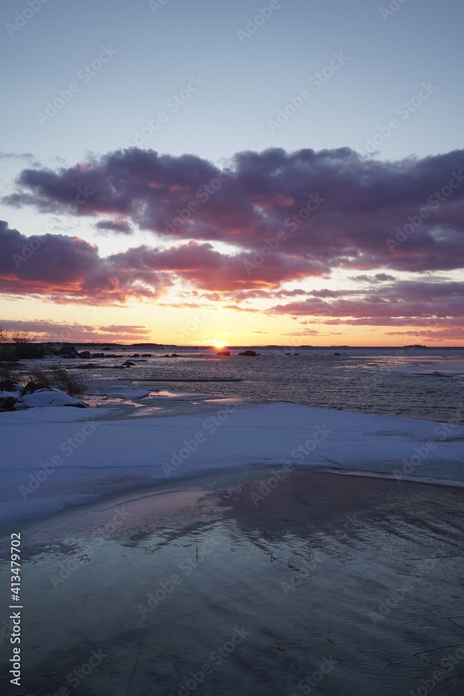 sunset over the sea with sea ice