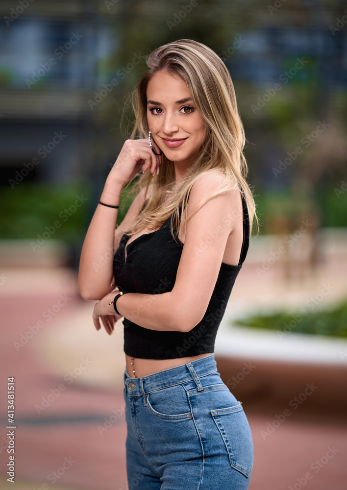Portrait of young woman at outdoors. Portrait of young woman at outdoors.