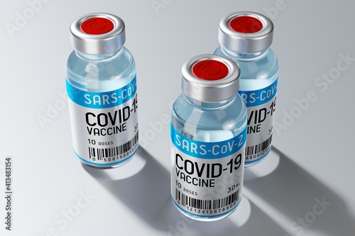 Three covid-19 / SARS-CoV-2 / coronavirus vaccine ampoules isolated on grey background - 3D illustration