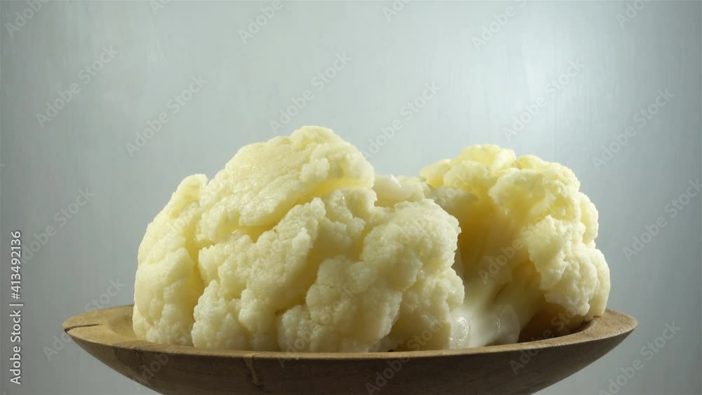 Pieces of cauliflower on a plate in 4K