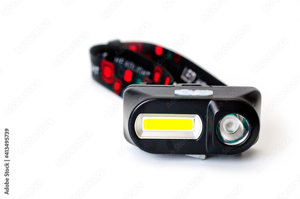 LED headlamp with two light sources for tourism, sports and work. LED headlamp with two light sources for tourism, sports and work.