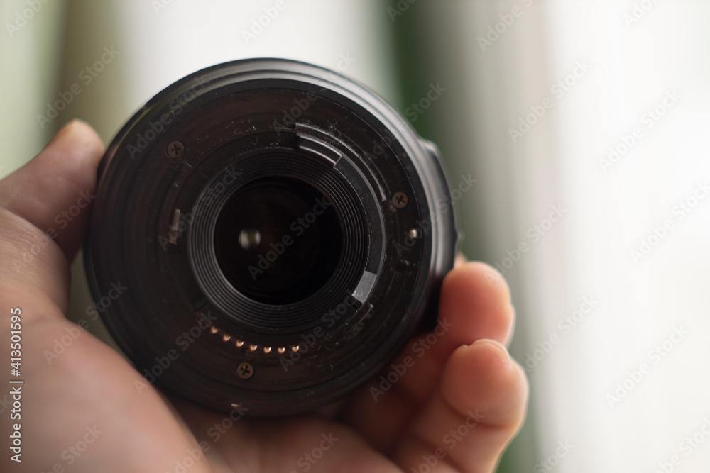 lens in hand lens in hand