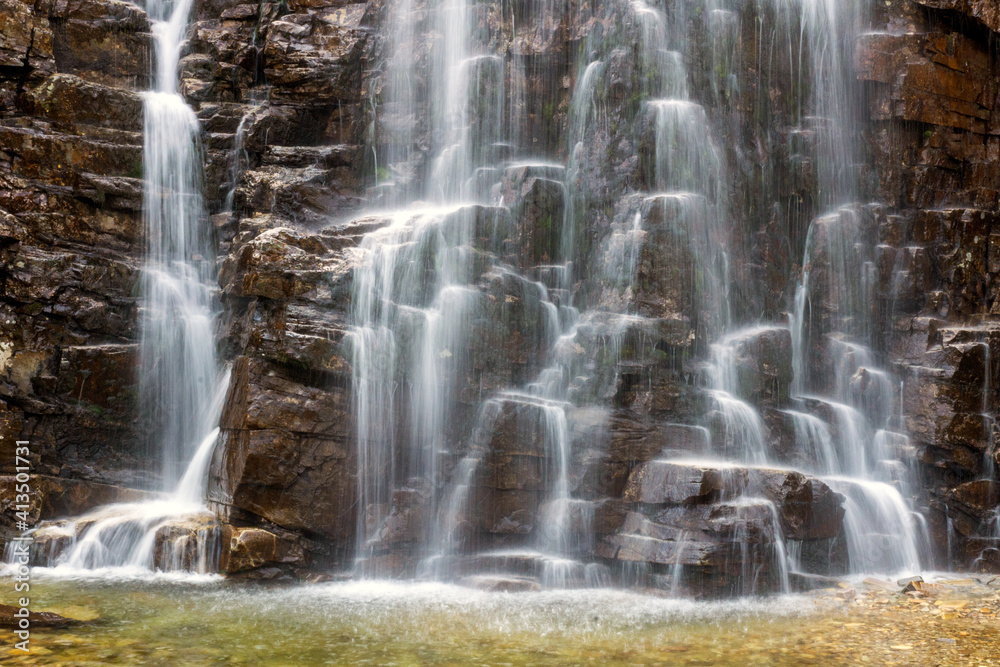 Waterfall cascade outdoors off the grid. Waterfall cascade outdoors off the grid.