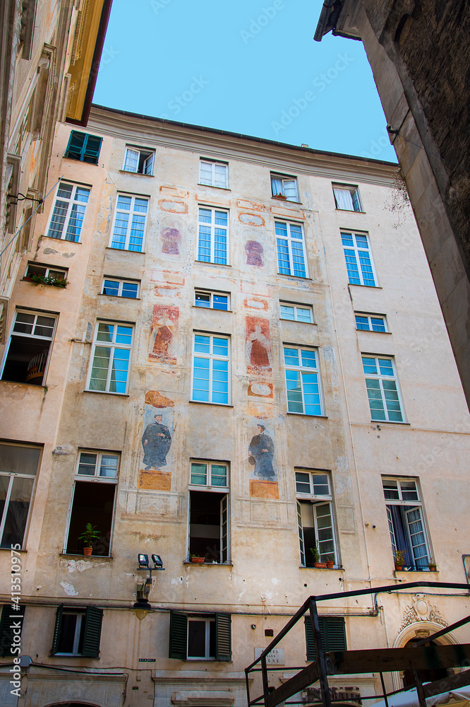 Naklejka premium Genoa Italy is a city full of wonderful architecture and historic palaces.These contrast with the narrow alleys in the old city. Statues and churches are everywhere. It is a city that needs exploring