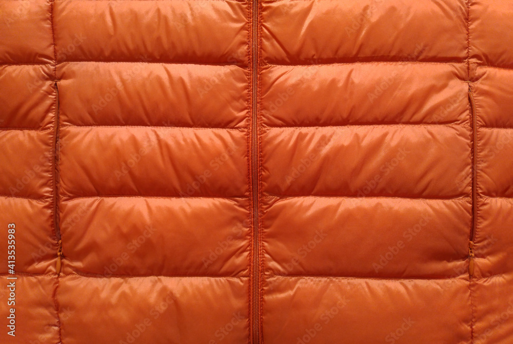 Down jacket fabric background, orange puffer jacket texture Stock Photo |  Adobe Stock