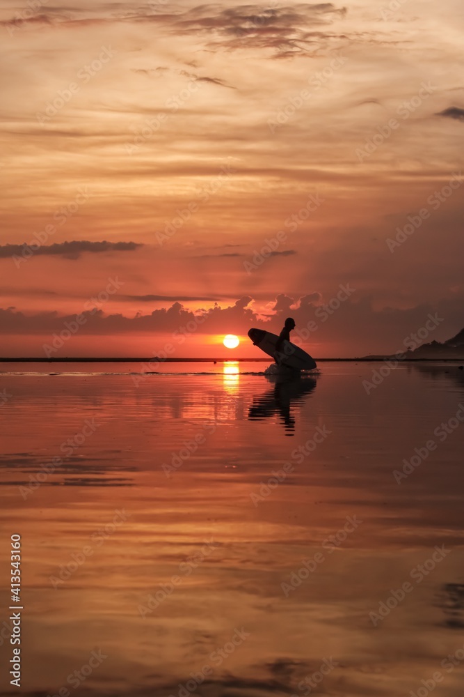 silhouette of a person kayaking