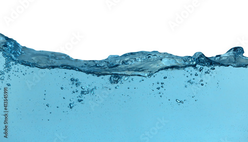 Splash of pure water on beige background, closeup