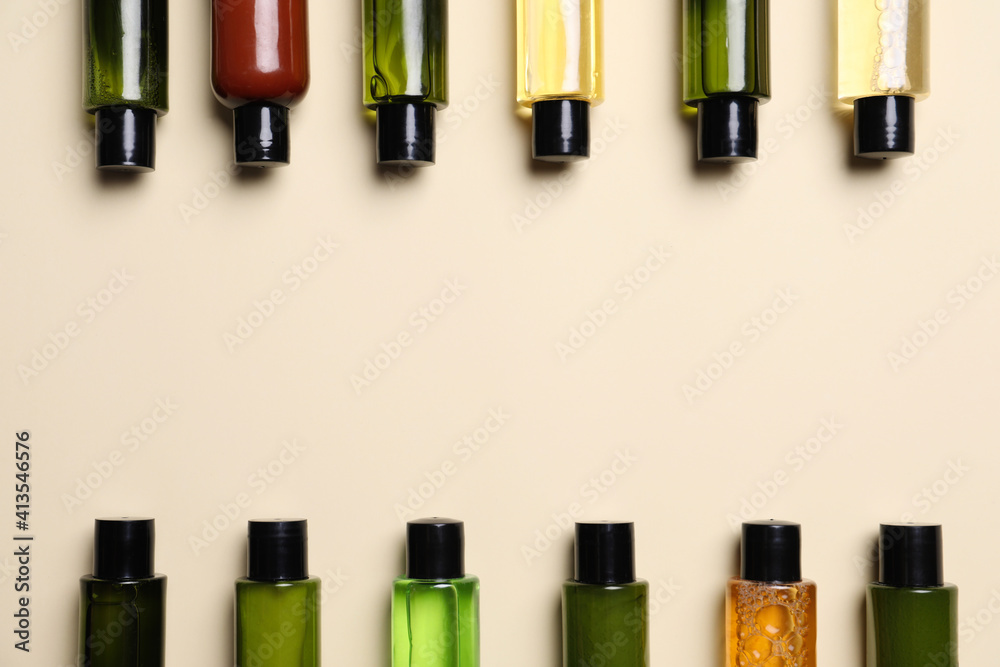 Bottles with cosmetic products, flat lay. Space for text Bottles with cosmetic products, flat lay. Space for text
