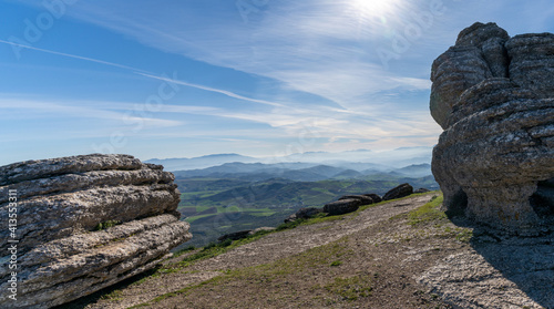 landscape view of the el Torcal rock formations and the Montes de Malaga Nature Park in Andalusia