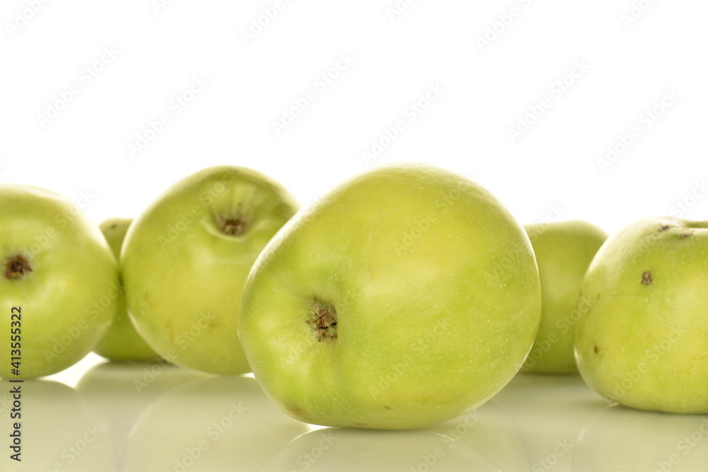 Several organic green apples by Renet Simirenko, close-up, isolated on white. Several organic green apples by Renet Simirenko, close-up, isolated on white.