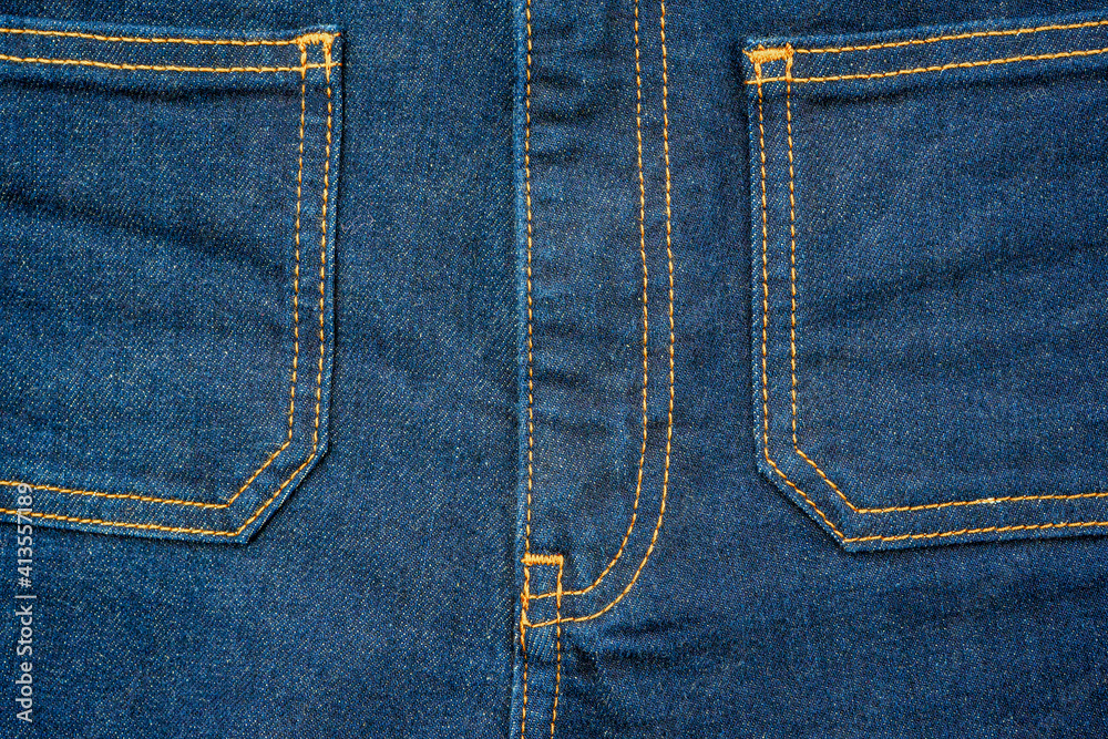 Blue jeans denim front pockets. Close up photo. Blue jeans denim front pockets. Close up photo.