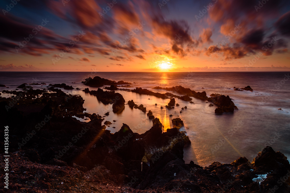 sunset on the ocean.
panorama of the coast in azores islands during sunset. portugal