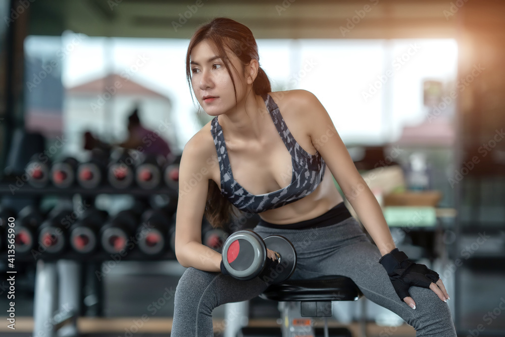 Soft focus consept women are exercising in gym fitness. Beautiful women in good shape from taking care of their bodies. Health concept. Soft focus consept women are exercising in gym fitness. Beautiful women in good shape from taking care of their bodies. Health concept.