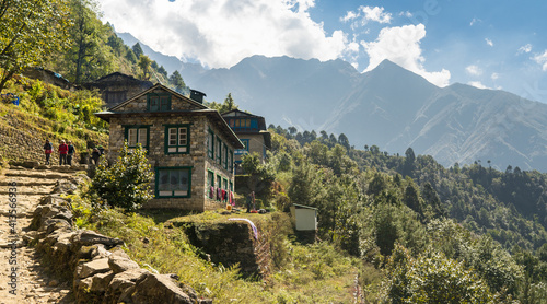 Fotografie old house in the mountains, guesthouse on the trek in Nepal, trekking in the Him