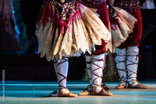 Closeup of ballerinas dancing. French style costume