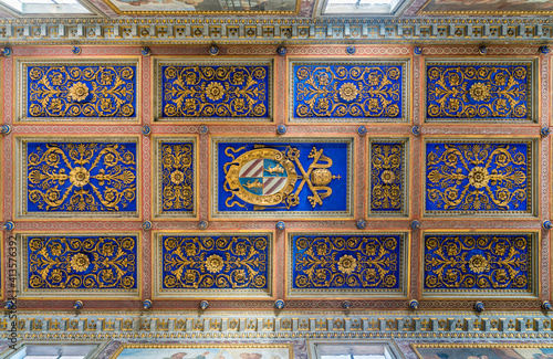 The marvelous ceiling of the Basilica of San Nicola in Carcere in Rome, Italy.
