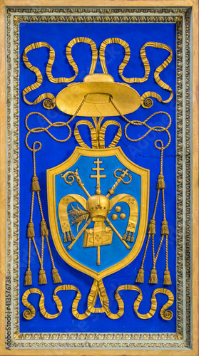 Bishop emblem on the ceiling of the Basilica of San Nicola in Carcere in Rome, Italy.