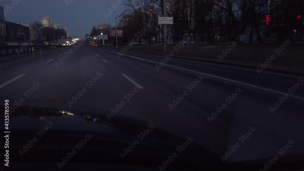 Time Lapse road view from a driving car in the early morning, bright moon at the sky, Traveling by the car, road traffic. Time Lapse road view from a driving car in the early morning, bright moon at the sky, Traveling by the car, road traffic.