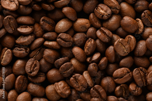 TOP VIEW: Close Up of Roasted coffee beans. 