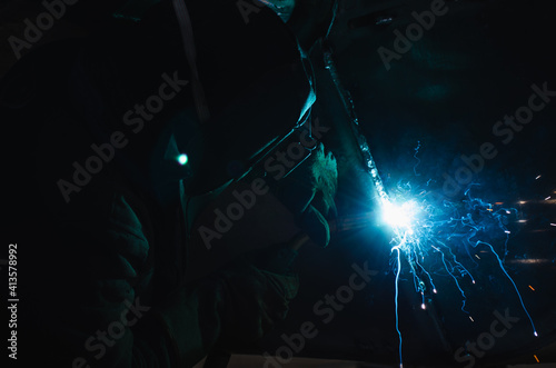A welder working on aluminium welding