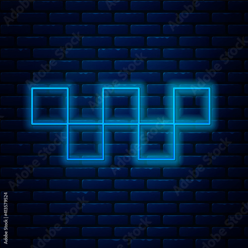 Glowing neon line Taxi car roof icon isolated on brick wall background. Vector.