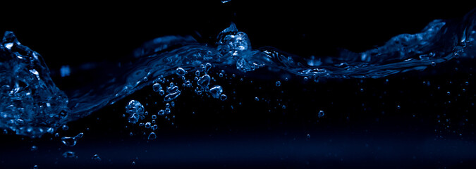 A wave on a black background