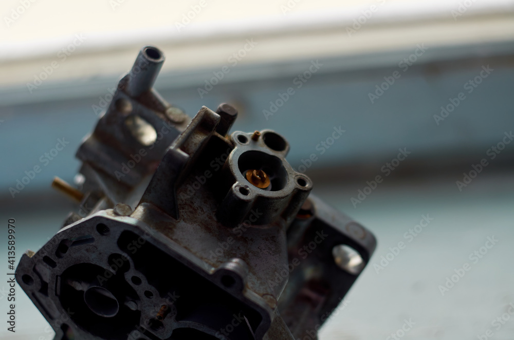 Close up of details of car carburetor Close up of details of car carburetor