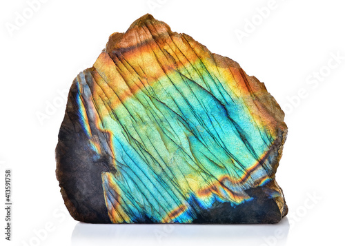 Sample of Amazing rare colorful iridescence Blue Labradorite/Spectrolite gemstone rough or geode. Aurora Borealis mineral stone closeup on white background. Beautiful piece of expensive Crystal photo