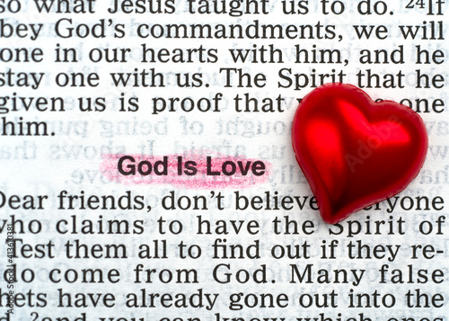 фотографія God is love concept of bible with heart