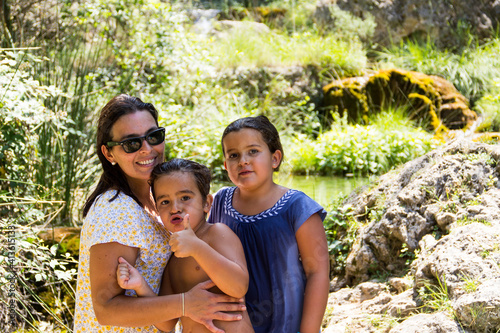 portrait of family next to a river, in bogarra albacete photo
