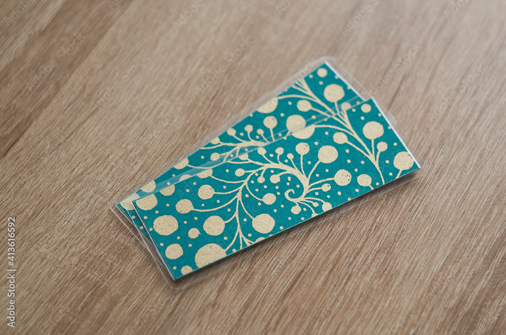 turquoise and gold metallic bookmarks on the table turquoise and gold metallic bookmarks on the table