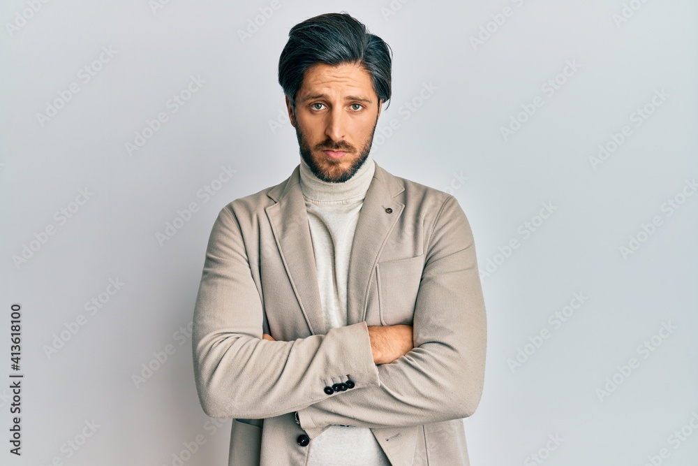 Young hispanic man with arms crossed gesture depressed and worry for distress, crying angry and afraid. sad expression. Young hispanic man with arms crossed gesture depressed and worry for distress, crying angry and afraid. sad expression.