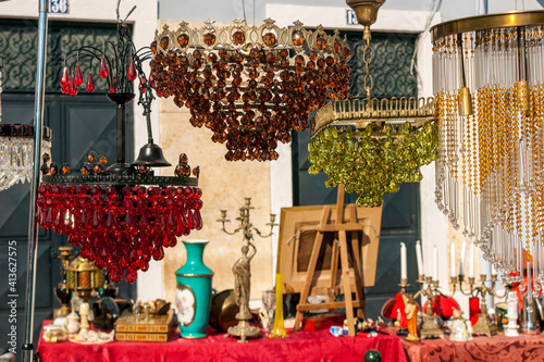 Different objects for sale in the antique flea market called Feira da Ladra in Alfama at Campo de Santa Clara, Lisbon