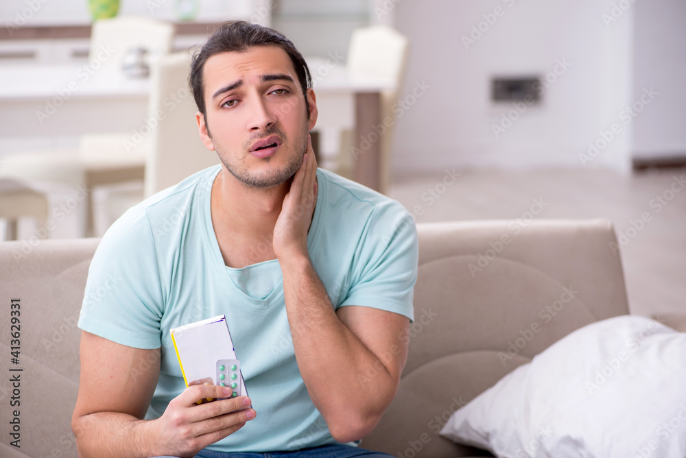 Young man suffering from sore throat Young man suffering from sore throat