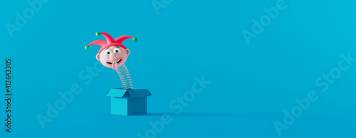 Fotografi Funny Jack in the box on the blue background